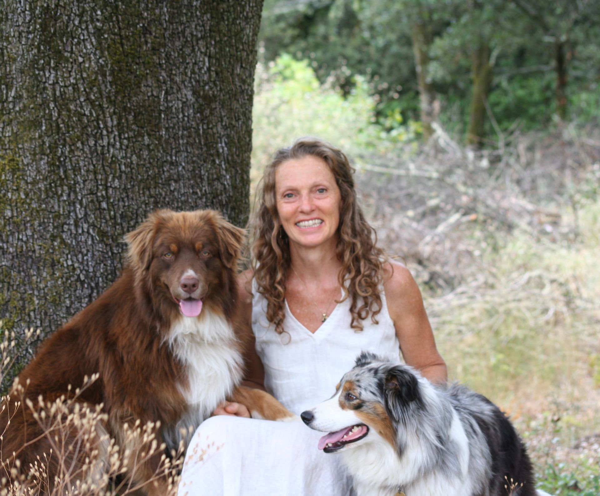 Portrait de la thérapeute avec ses chiens